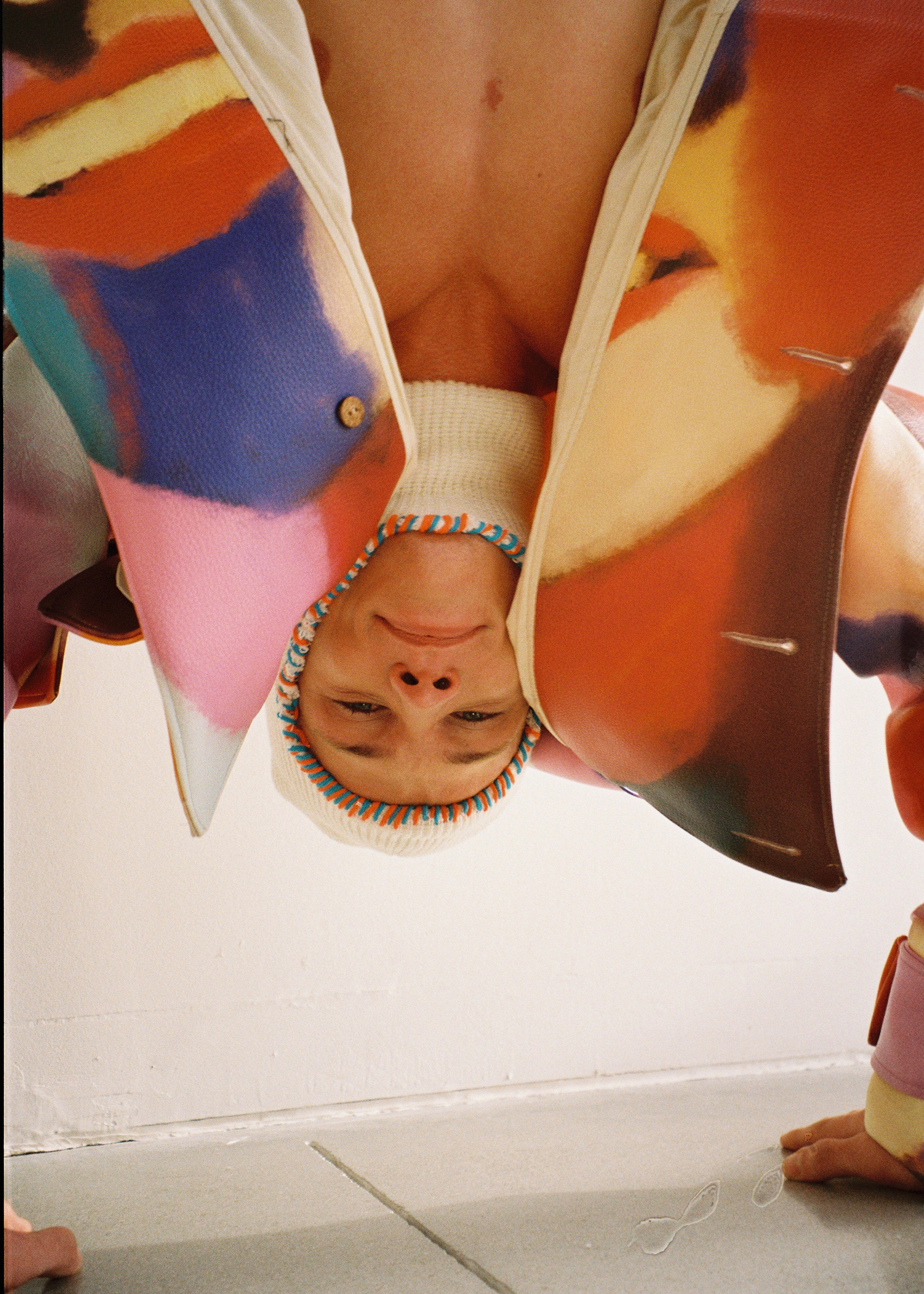 Portrait — colorful coat, inverted frame